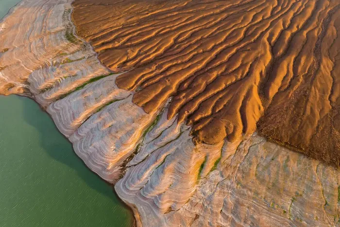 Framed Print : Aerial view of the dry reservoir in mountains
