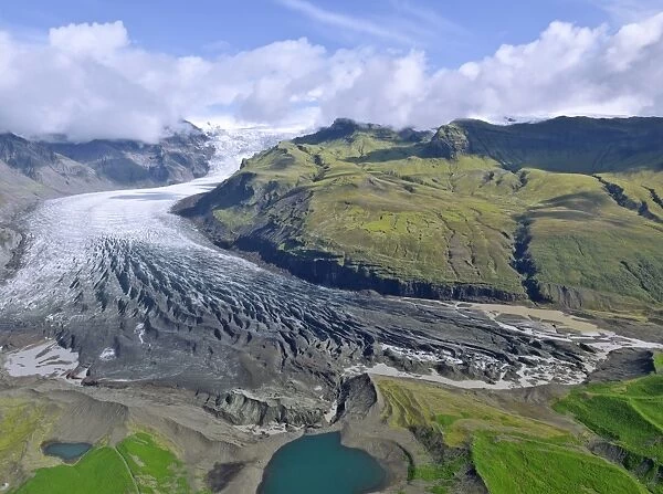 Aerial view of the glacier tongue of Svinanesjoekull Glacier, a part of Vatnajoekull or Vatna Glacier, Southern Region, Iceland