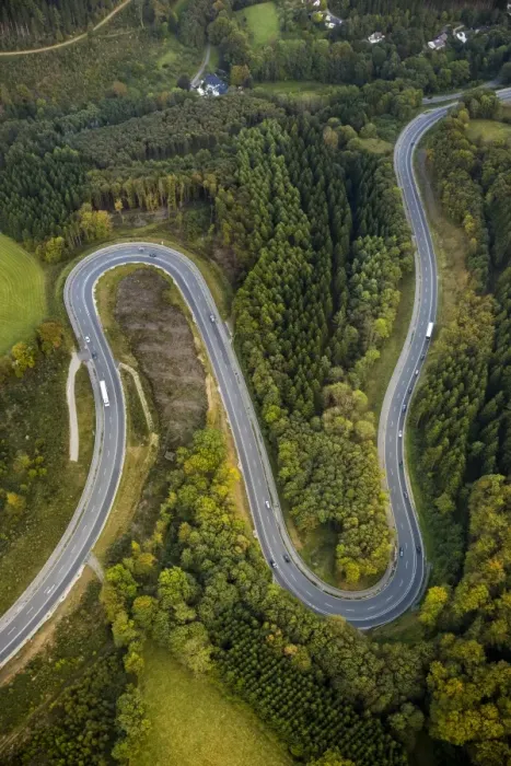 Framed Print : Aerial view, hairpin curves, winding road in the Sauerland forests, between Herscheid and Halver, North Rhine-Westphalia, Germany Framed Print : Aerial view, hairpin curves, winding road in the Sauerland forests, between Herscheid and Halver, North Rhine-Westphalia, Germany