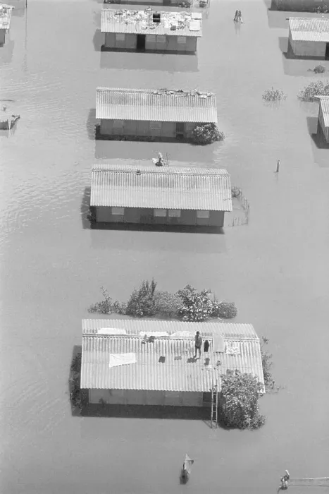 Framed Print : Aerial View Of Man On Roof In Flood Framed Print : Aerial View Of Man On Roof In Flood