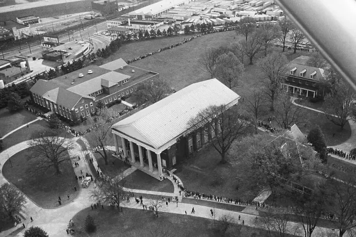 Framed Print : Aerial View Shows Winding Line Of People