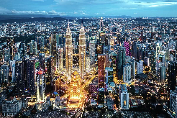 Aerial view of skyline at night, Kuala Lumpur, Malaysia