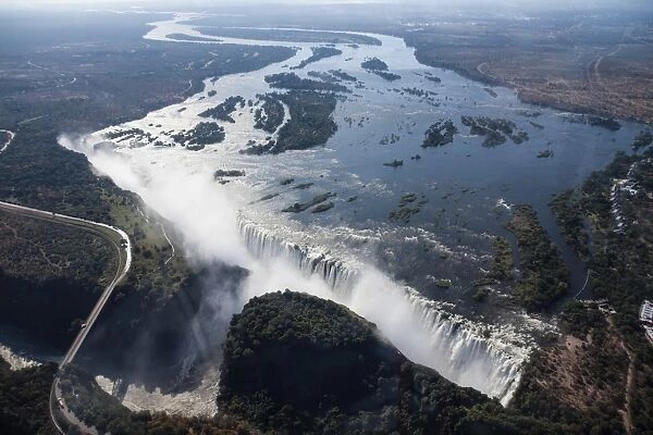 Aerial view, Victoria Falls with the Victoria Falls Bridge over the Zambezi River, Livingstone, Zambia