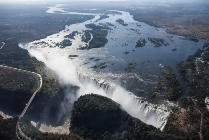 Framed Print : Aerial view, Victoria Falls with the Victoria Falls Bridge over the Zambezi River, Livingstone, Zambia Framed Print : Aerial view, Victoria Falls with the Victoria Falls Bridge over the Zambezi River, Livingstone, Zambia