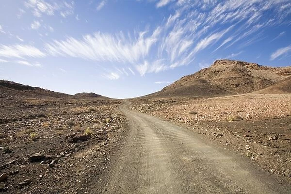 Africa, Barren, Cloud, Color Image, Day, Desert, Dirt Road, Generic Location, Horizontal