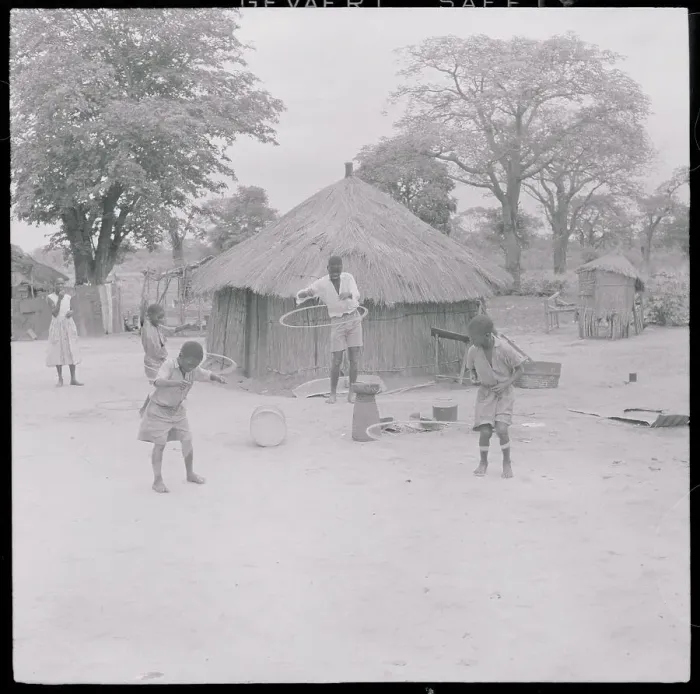 Framed Print : African Children Enjoying Hula Hoops Framed Print : African Children Enjoying Hula Hoops