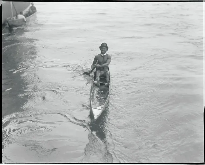 Framed Print : African Coin Diver and Entertainer Boating to Shore Framed Print : African Coin Diver and Entertainer Boating to Shore
