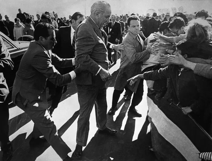 Framed Print : Agent Tugging on President Lyndon Johnson