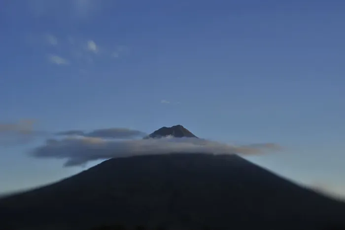 Framed Print : The Agua volcano ringed by clouds at dusk Framed Print : The Agua volcano ringed by clouds at dusk