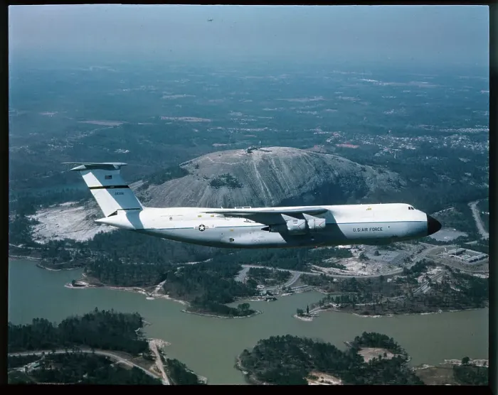 Framed Print : US Air Force Plane Flying by Stone Mountain