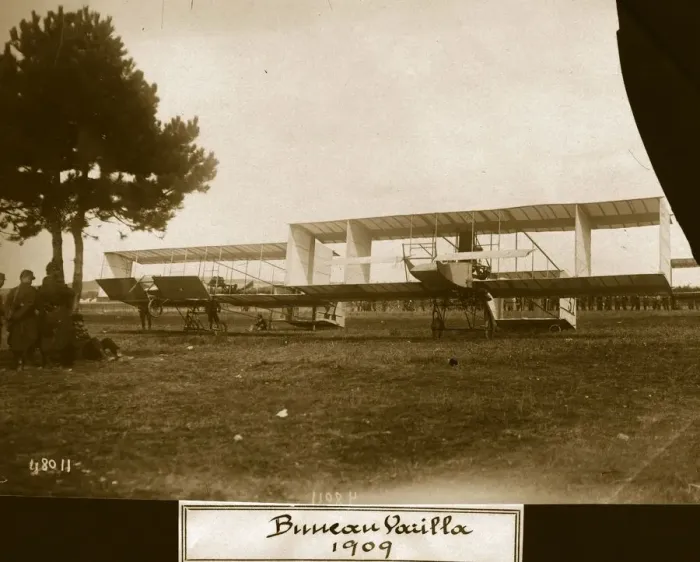 Framed Print : Air Meet. circa 1909: Two biplane boxkites of Farman-Voisin influence guarded Framed Print : Air Meet. circa 1909: Two biplane boxkites of Farman-Voisin influence guarded