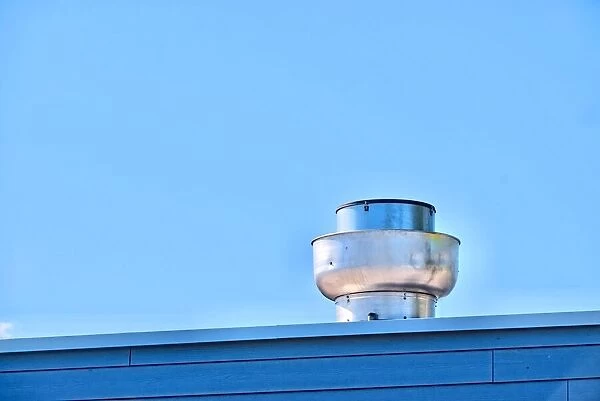 Air Vent. A color photo of an air vent on the roof of a commercial building in Portland