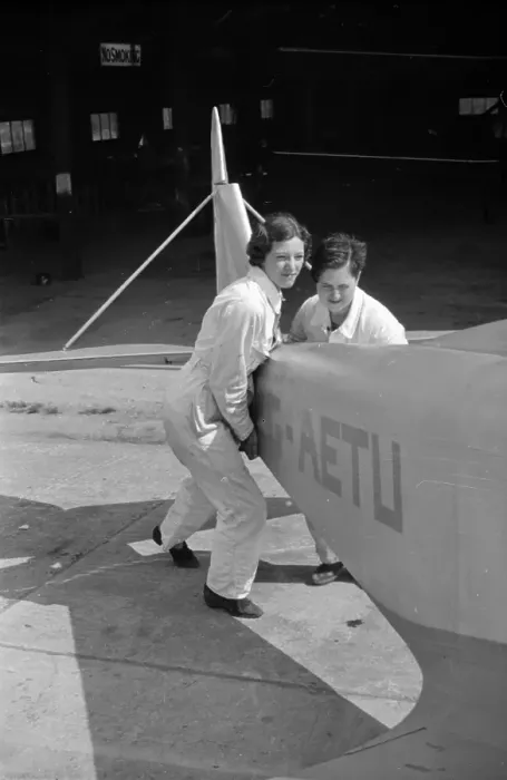 Framed Print : Air Women. 22nd October 1938: Pushing the plane back in its hangar after Framed Print : Air Women. 22nd October 1938: Pushing the plane back in its hangar after