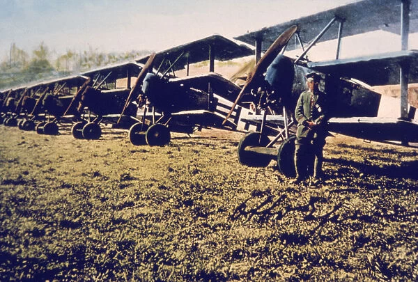 Airman Stands Near Fokker DR-1s