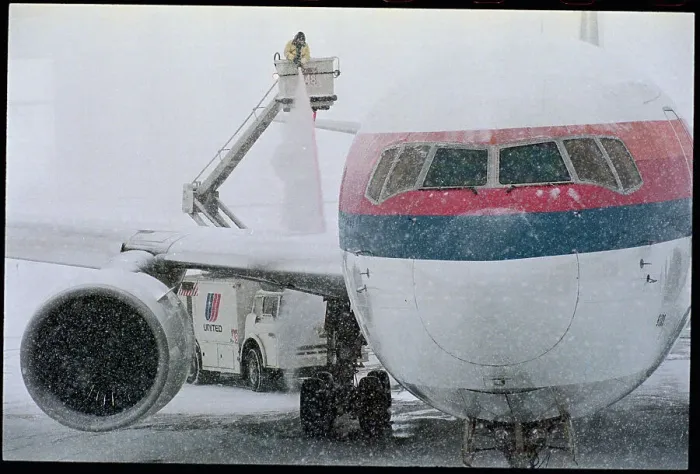 Framed Print : Airplane Being De-Iced Framed Print : Airplane Being De-Iced