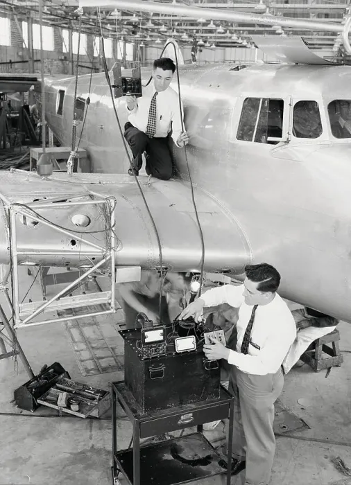 Framed Print : Airplane Engineers Working on the Flying Laboratory Framed Print : Airplane Engineers Working on the Flying Laboratory