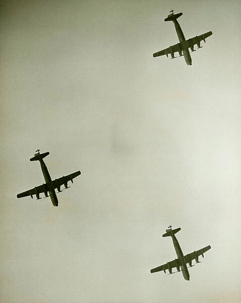 Three airplanes in flight, (B&W), view from below