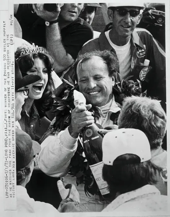 Framed Print : A.J. Foyt With Champagne After Victory Framed Print : A.J. Foyt With Champagne After Victory