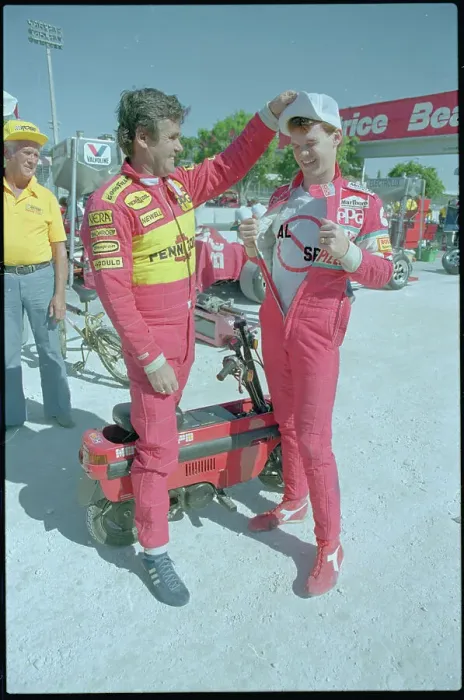 Framed Print : Al Unser Jr. Showing T-shirt to Father Framed Print : Al Unser Jr. Showing T-shirt to Father