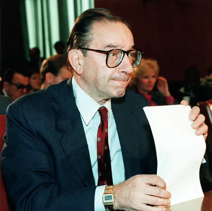Framed Print : Alan Greenspan Holding Document Framed Print : Alan Greenspan Holding Document