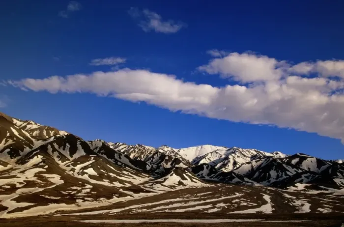 Framed Print : Alaska, Denali National park, cumulous clouds, Alaska Range in spring snow