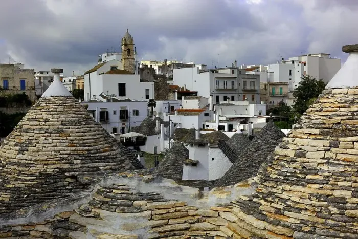 Framed Print : Alberobello, view over the trulli to the church of Santa Lucia, Puglia, Italy Framed Print : Alberobello, view over the trulli to the church of Santa Lucia, Puglia, Italy