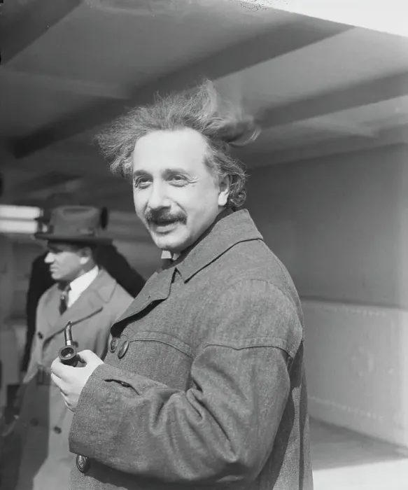 Framed Print : Albert Einstein Holding a Pipe Framed Print : Albert Einstein Holding a Pipe