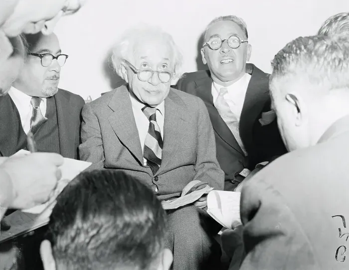 Framed Print : Albert Einstein Reading Statement to Press Framed Print : Albert Einstein Reading Statement to Press