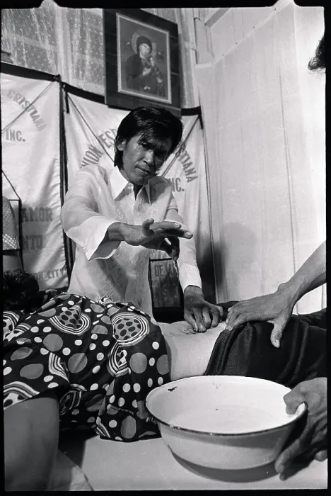 Framed Print : Alex Orbito is Shown Treating a Patient Framed Print : Alex Orbito is Shown Treating a Patient