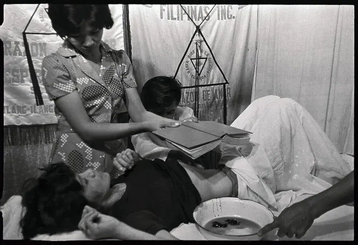 Framed Print : Alex Orbito Treating Patient Framed Print : Alex Orbito Treating Patient