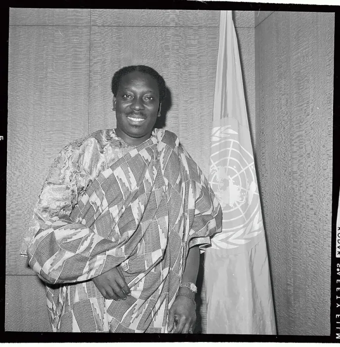 Framed Print : Alex Quaison Sackey Standing Next to United Nations Flag Framed Print : Alex Quaison Sackey Standing Next to United Nations Flag