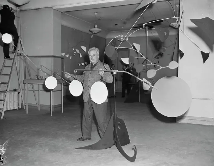 Framed Print : Alexander Calder Posing with One of His Sculptures Framed Print : Alexander Calder Posing with One of His Sculptures