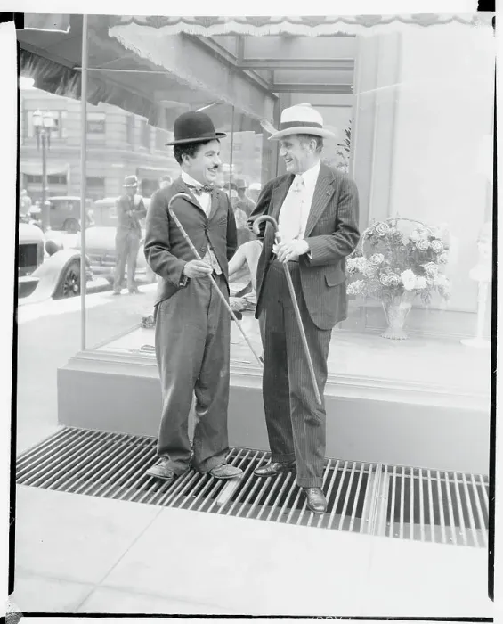 Framed Print : Alexander Moore Laughing with Charlie Chaplin Framed Print : Alexander Moore Laughing with Charlie Chaplin
