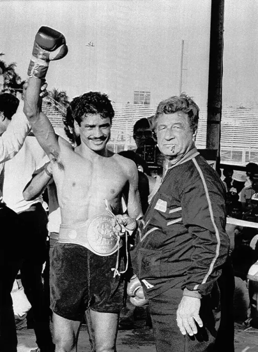 Framed Print : Alexis Arguello Standing with Trainer Framed Print : Alexis Arguello Standing with Trainer