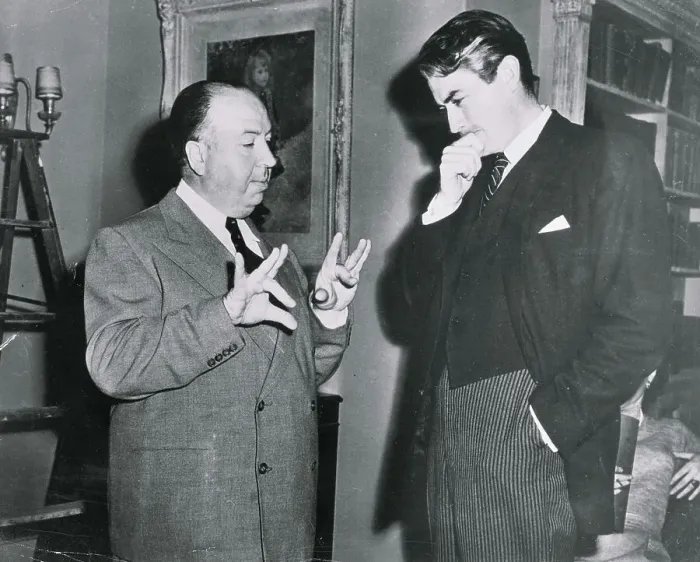 Framed Print : Alfred Hitchcock Conversing with Gregory Peck
