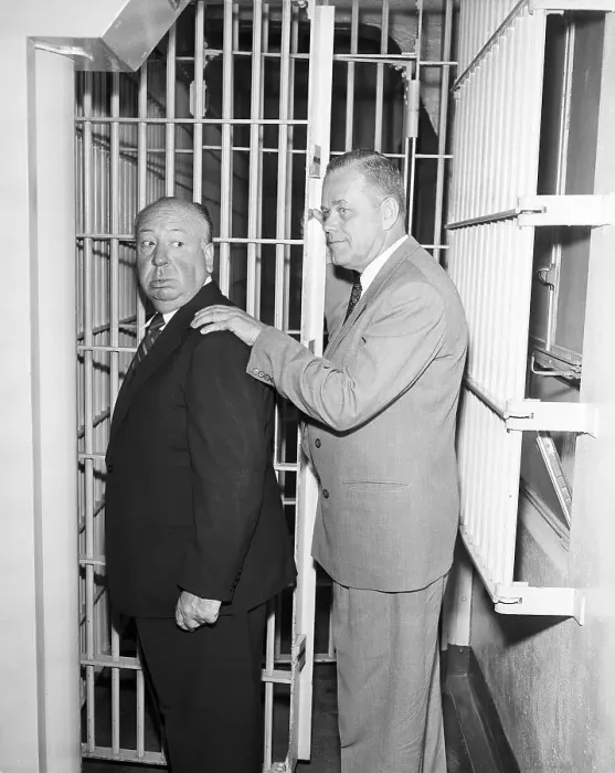 Framed Print : Alfred Hitchcock In Gag Arrest