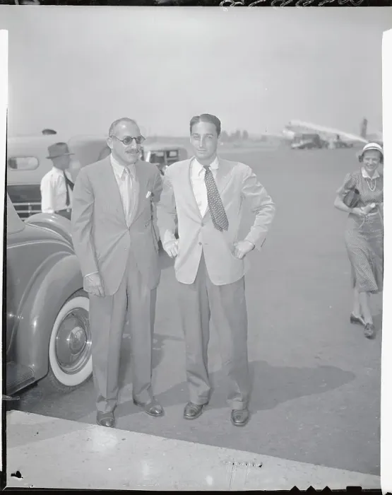 Framed Print : Alfred Knopf Sr. and Son Standing on Airport Runway Framed Print : Alfred Knopf Sr. and Son Standing on Airport Runway