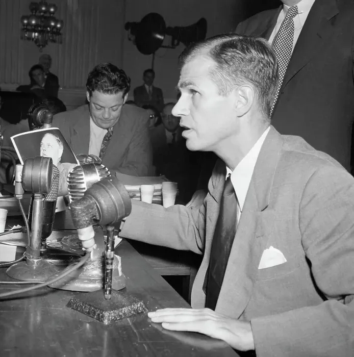Framed Print : Alger Hiss Looking at Photos of Whittaker Chambers Framed Print : Alger Hiss Looking at Photos of Whittaker Chambers
