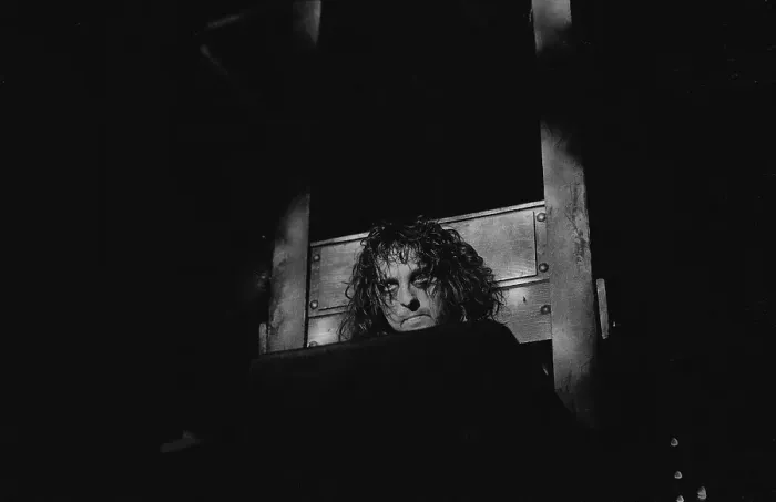 Framed Print : Alice Cooper with his head in a guillotine Framed Print : Alice Cooper with his head in a guillotine