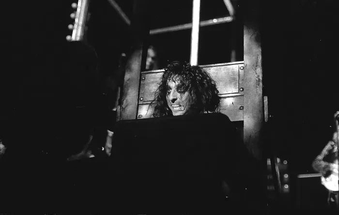 Framed Print : Alice Cooper with his head in a guillotine Framed Print : Alice Cooper with his head in a guillotine