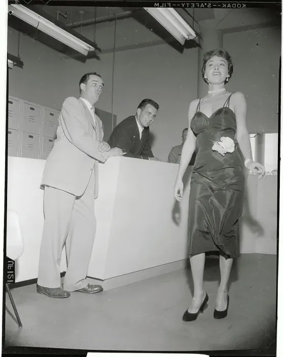 Framed Print : Alix Talton Walking Past Some Men