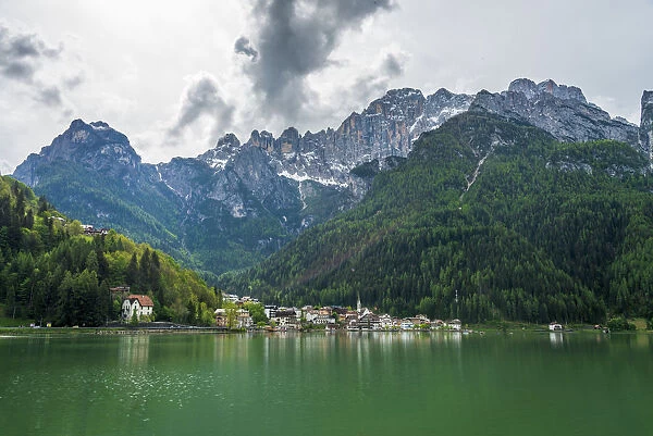 Alleghe village and lake in Veneto Dolomites