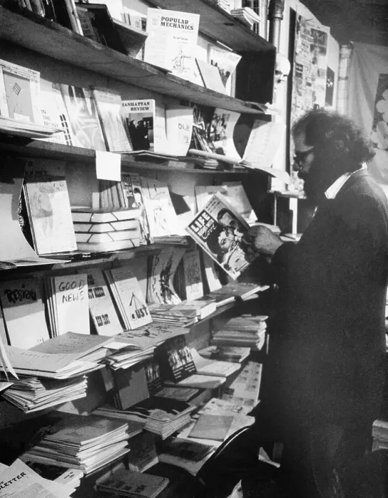 Framed Print : Allen Ginsberg Reading a Magazine Framed Print : Allen Ginsberg Reading a Magazine