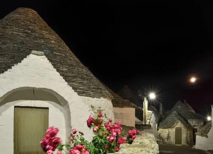 Framed Print : Alley with several trulli houses at night, Italy Framed Print : Alley with several trulli houses at night, Italy
