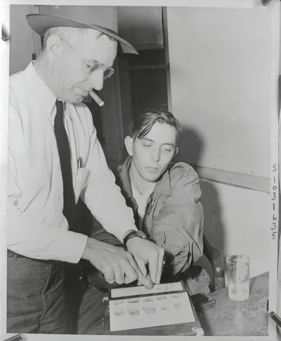 Framed Print : Alonzo Ellis Jones Being Fingerprinted