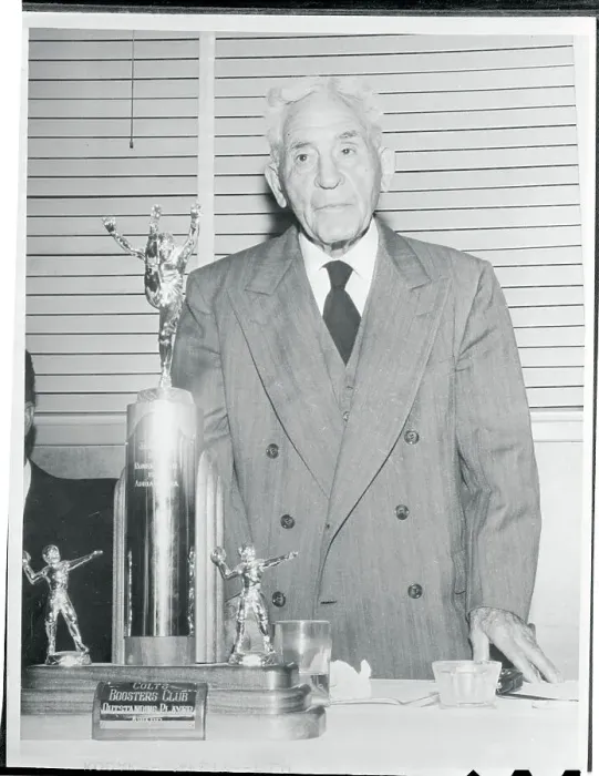 Framed Print : Alonzo Stagg Standing Near Large Trophy Framed Print : Alonzo Stagg Standing Near Large Trophy