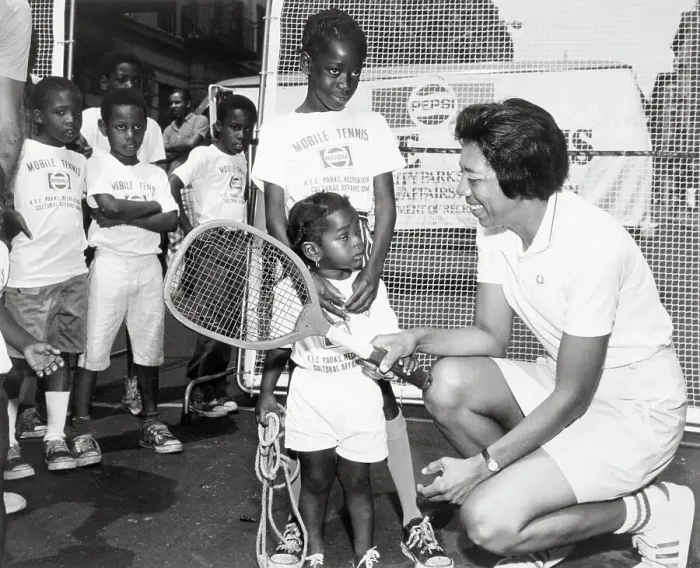 Framed Print : Althea Gibson Showing Racquet to Kids Framed Print : Althea Gibson Showing Racquet to Kids
