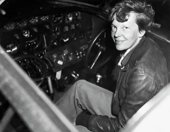 Framed Print : Amelia Earhart in the Cockpit of an Airplane Framed Print : Amelia Earhart in the Cockpit of an Airplane