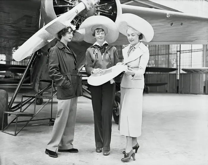 Framed Print : Amelia Earhart and Designers on Airfield Framed Print : Amelia Earhart and Designers on Airfield