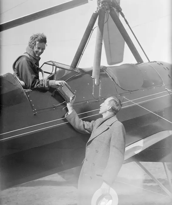 Framed Print : Amelia Earhart Handing Barograph to Luke Christopher Framed Print : Amelia Earhart Handing Barograph to Luke Christopher